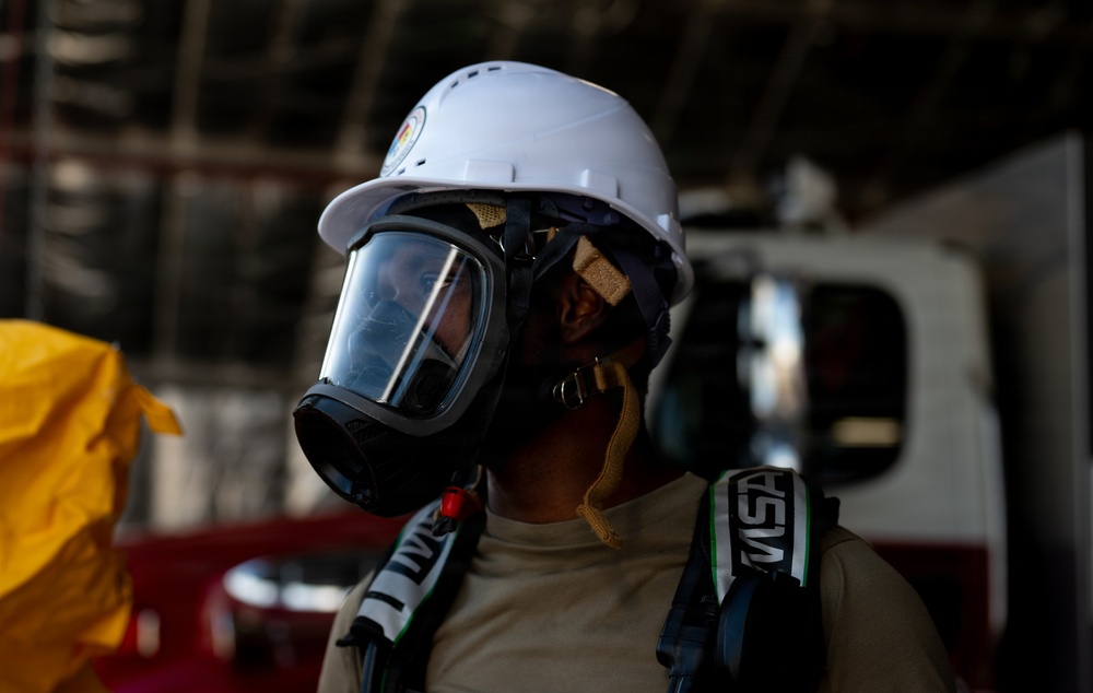 325th CES firefighters participate in hazardous material leak training