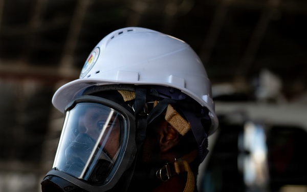 325th CES firefighters participate in hazardous material leak training