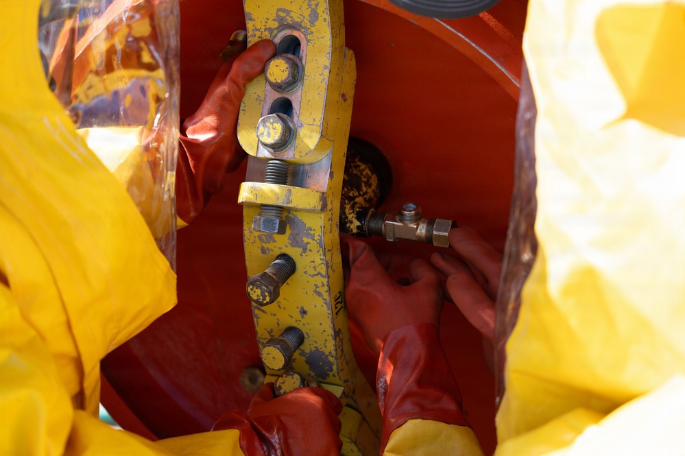 325th CES firefighters participate in hazardous material leak training