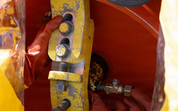 325th CES firefighters participate in hazardous material leak training