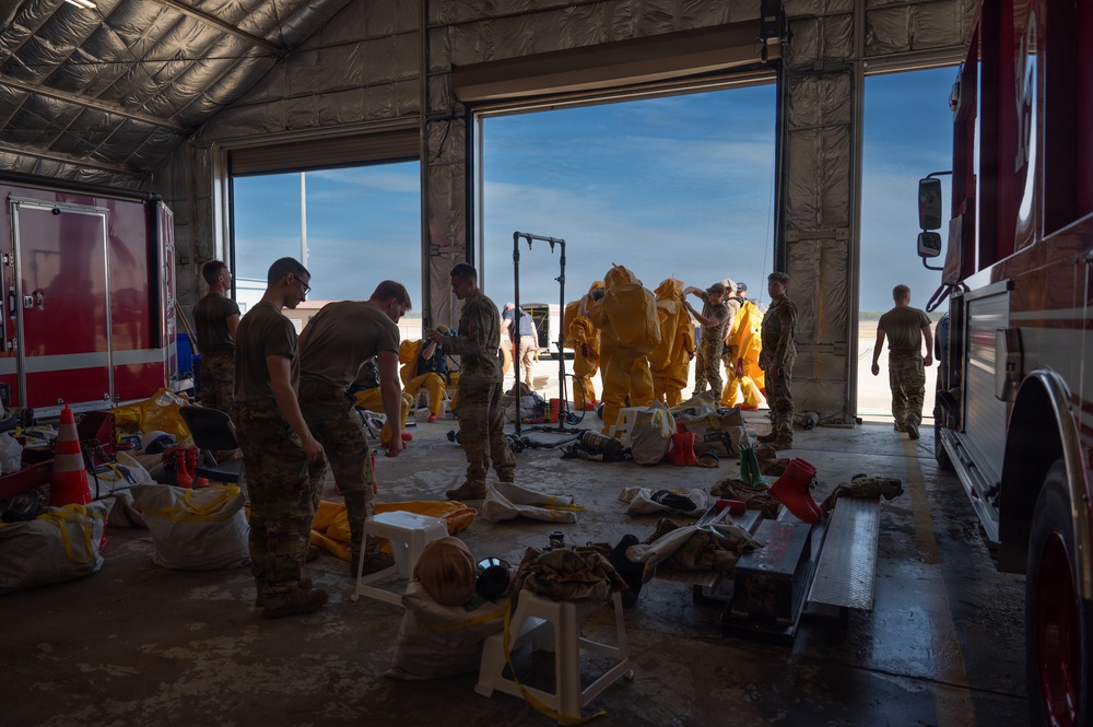 325th CES firefighters participate in hazardous material leak training