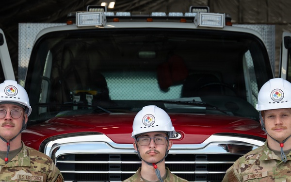 325th CES firefighters participate in hazardous material leak training