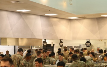 Soldiers and families celebrate the opening of Stack House Bistro