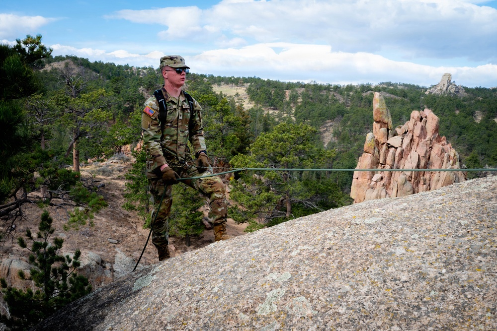 Medics prepare to move casualty with rope techniques