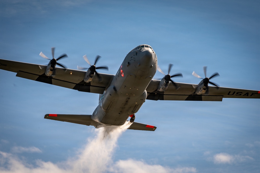 C-130 Dumps Water During Exercise