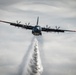 C-130 Drops Water Plume