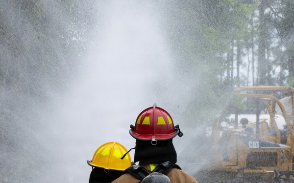 Under pressure: Firefighters undergo live-fire evaluations