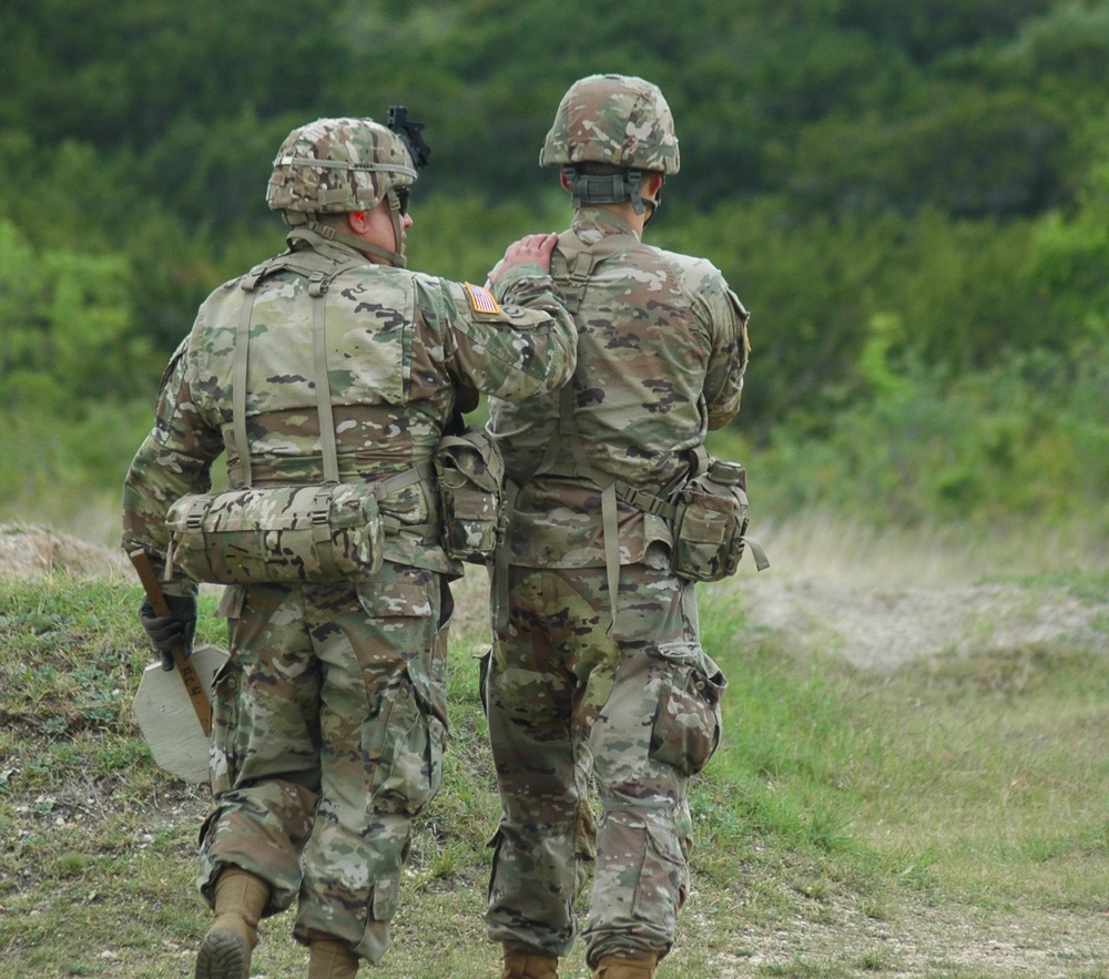 Reserve NCO Mentors Soldier During Weapons Qualification