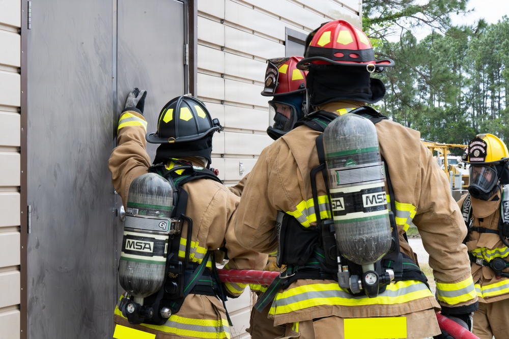 Under pressure: Firefighters undergo live-fire evaluations