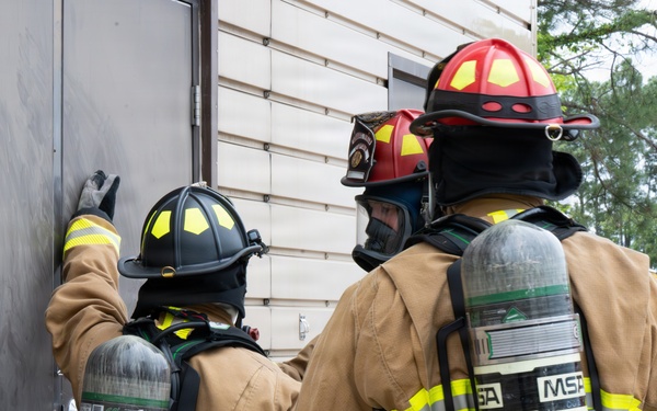 Under pressure: Firefighters undergo live-fire evaluations