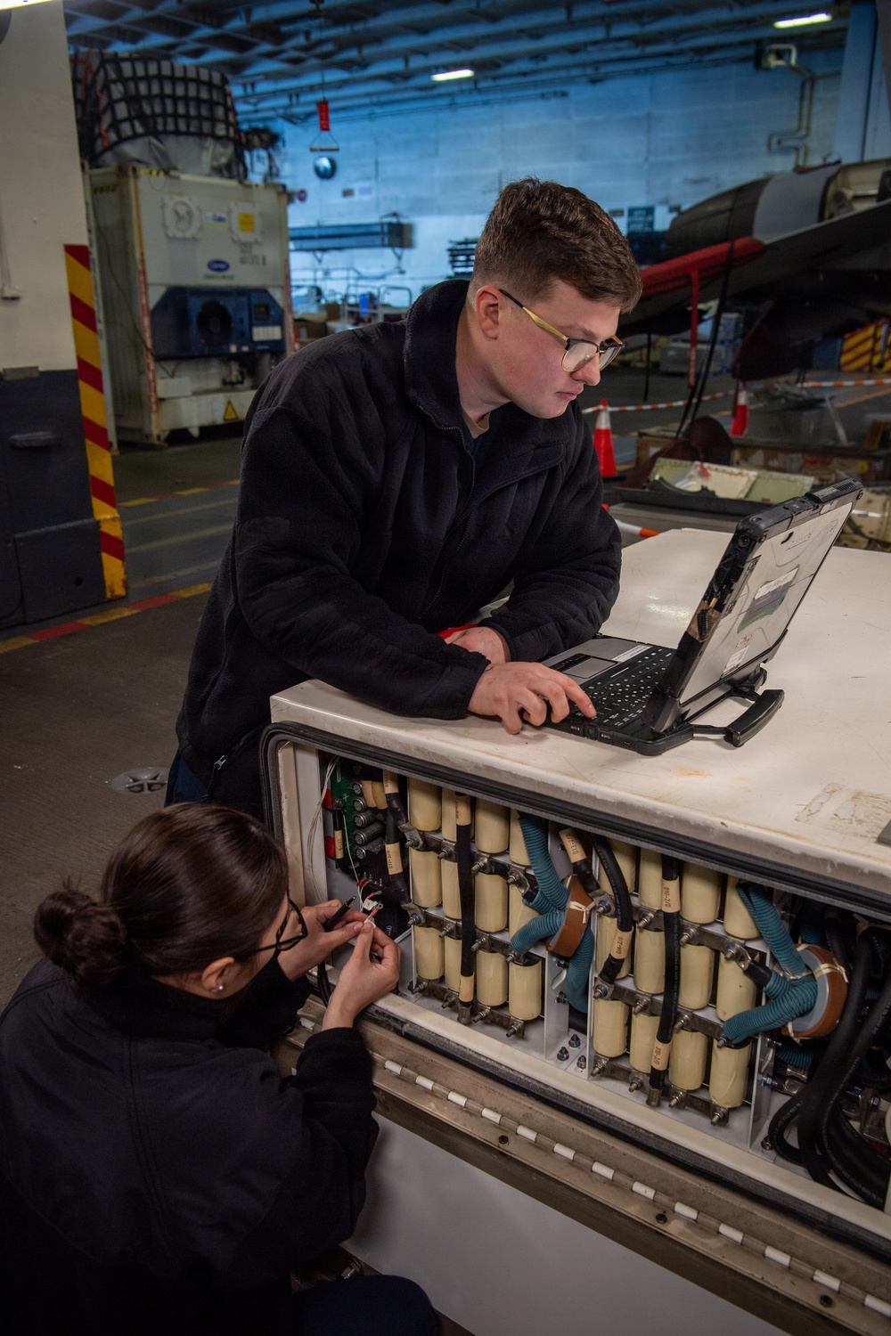 Sailors Conduct Maintenance