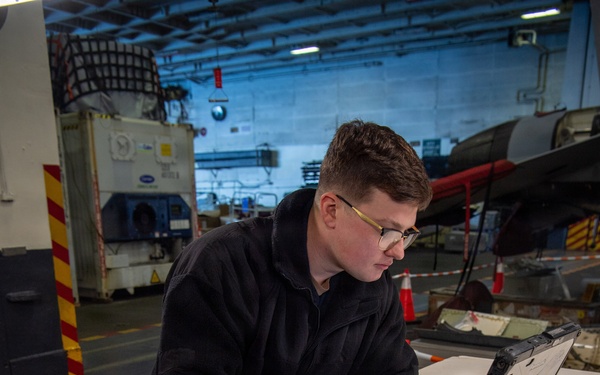 Sailors Conduct Maintenance