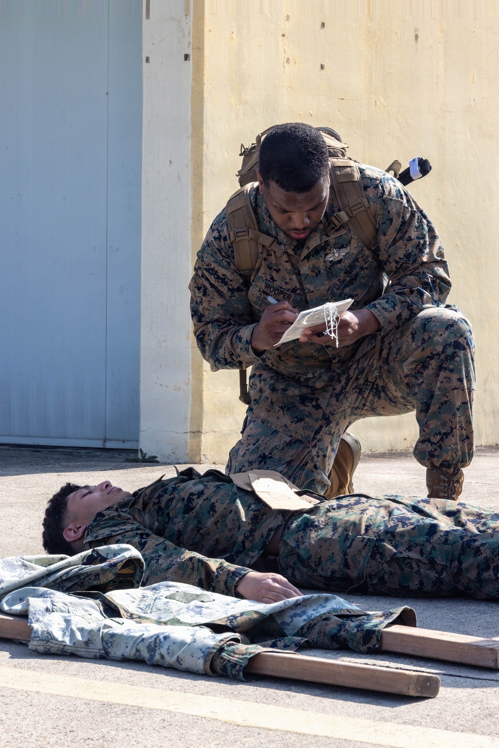 U.S. Marines provide medical care during a simulated mass casualty training event