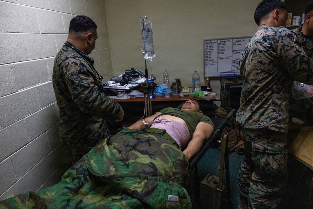 U.S. Marines provide medical care during a simulated mass casualty training event