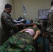 U.S. Marines provide medical care during a simulated mass casualty training event