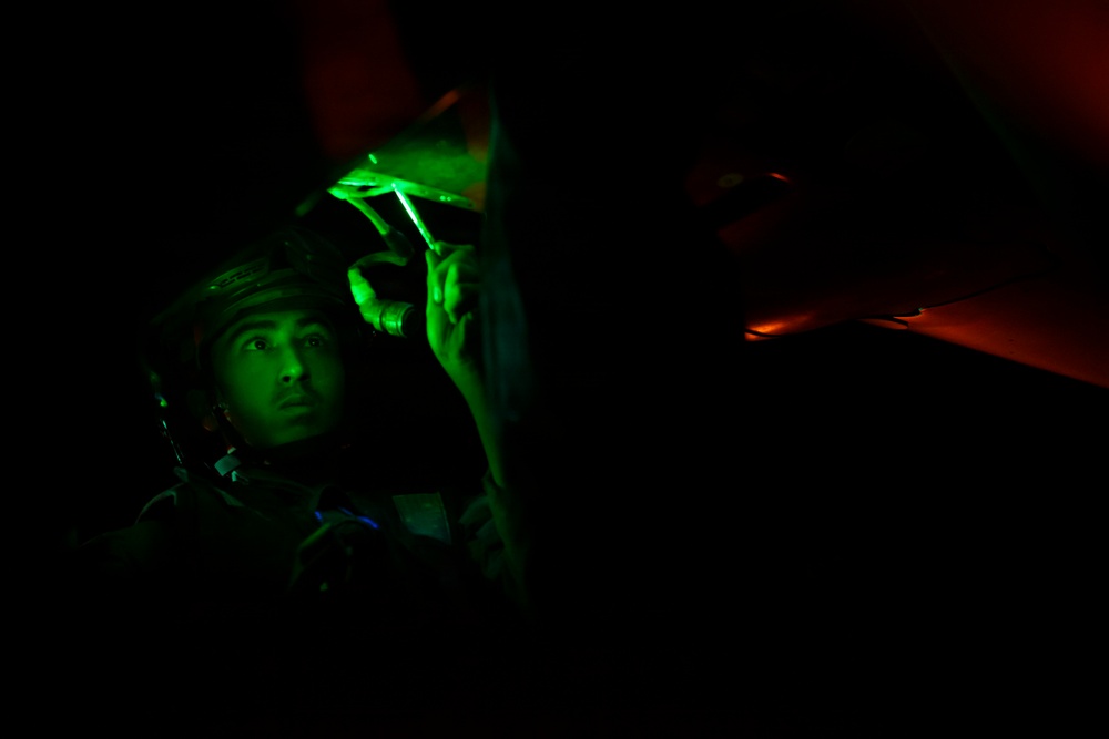U.S. Marines Conduct Night Time Aircraft Maintenance Aboard USS Boxer