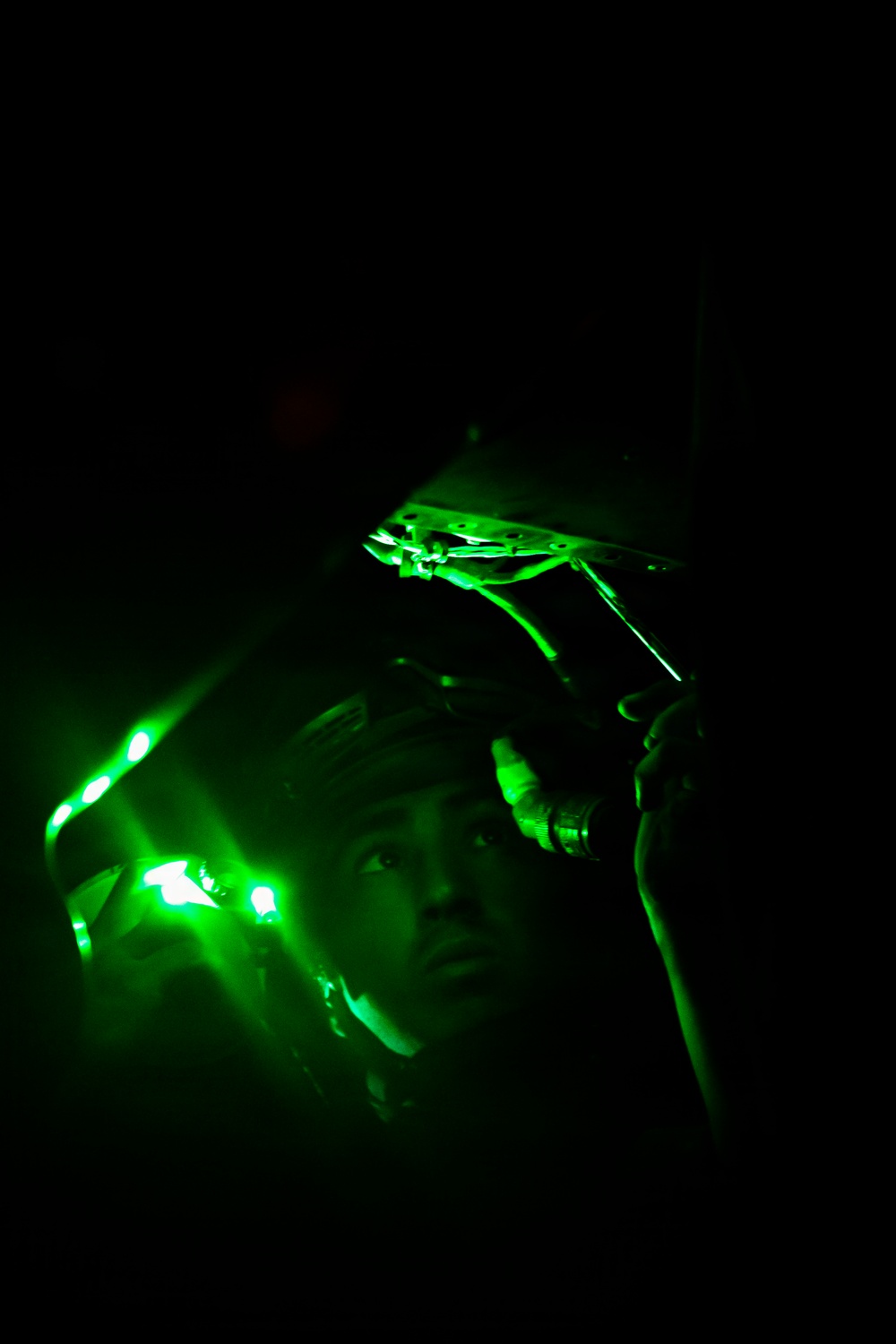 U.S. Marines Conduct Night Time Aircraft Maintenance Aboard USS Boxer