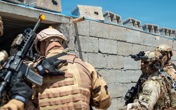 Multinational forces assault shoreline objective during Flintlock 2026