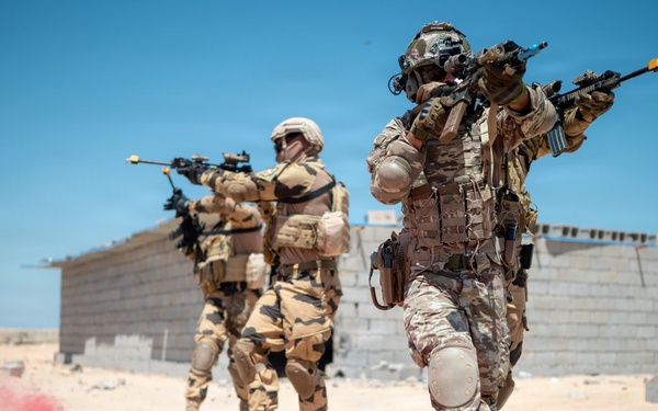 Multinational forces assault shoreline objective during Flintlock 2026