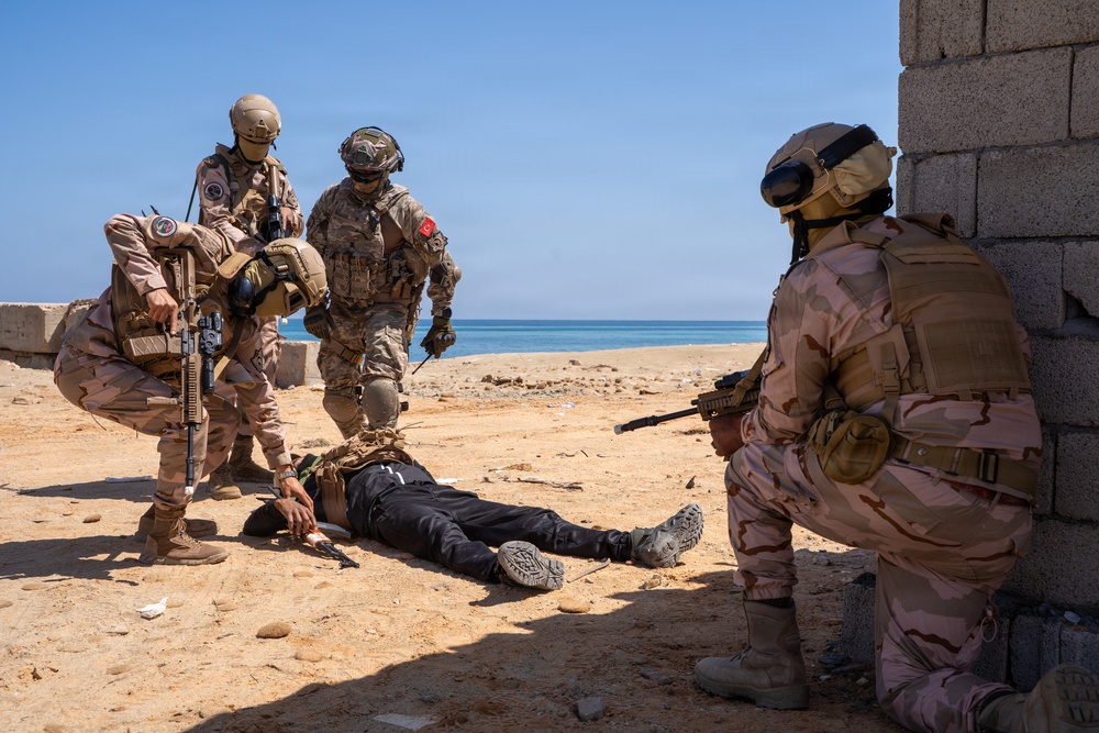 Multinational forces assault shoreline objective during Flintlock 2026