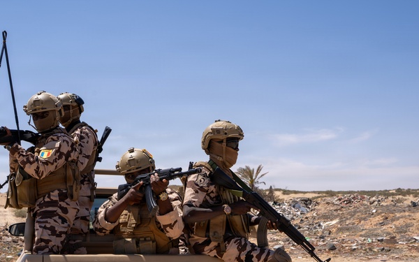 Multinational forces assault shoreline objective during Flintlock 2026