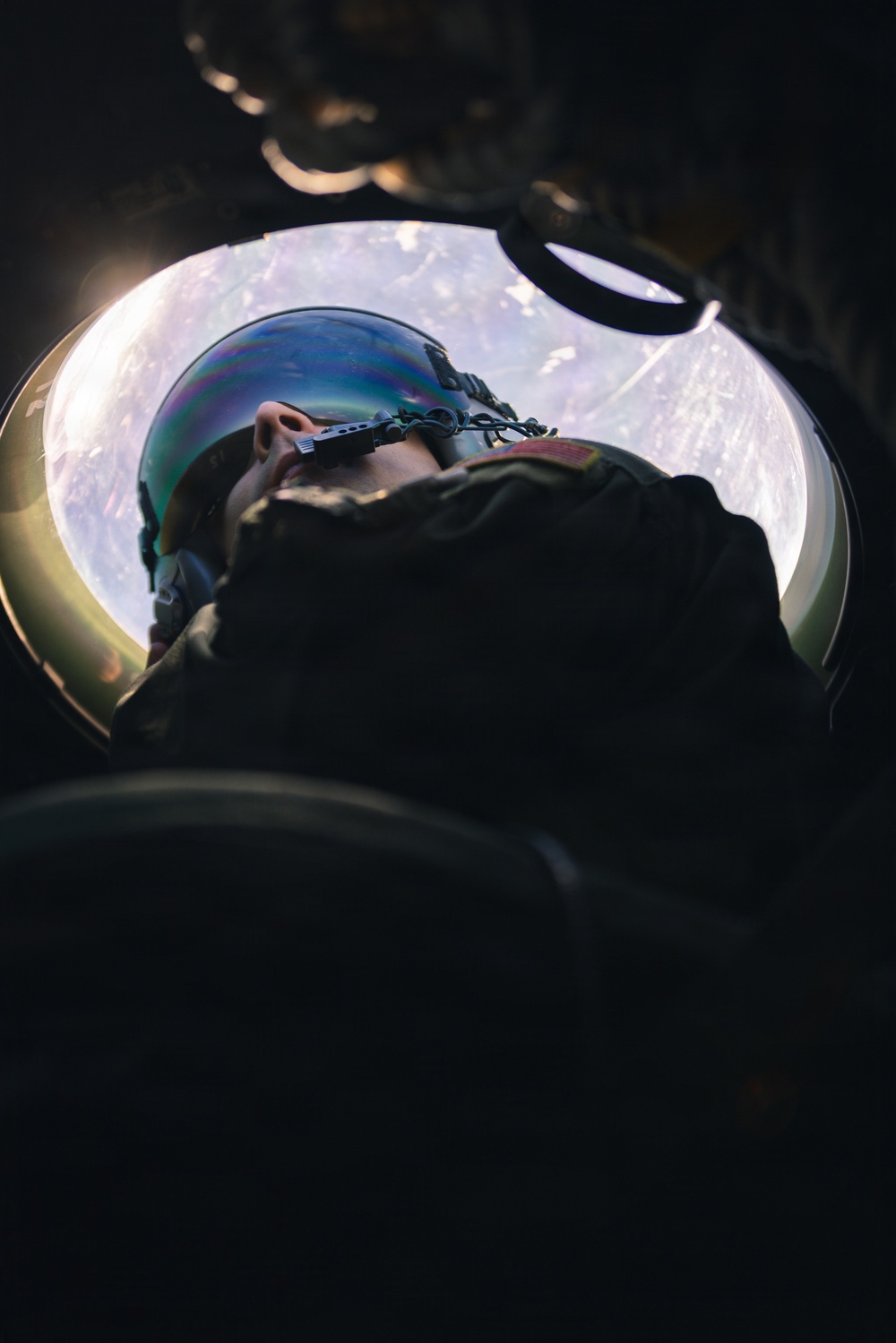 180th Airlift Squadron airmen fly alongside a MiG-29 fighter jet