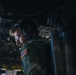180th Airlift Squadron airmen fly alongside a MiG-29 fighter jet