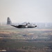 180th Airlift Squadron airmen fly alongside a MiG-29 fighter jet