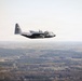 180th Airlift Squadron airmen fly alongside a MiG-29 fighter jet