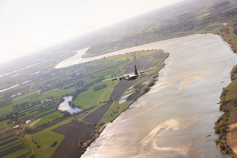 180th Airlift Squadron airmen fly alongside a MiG-29 fighter jet