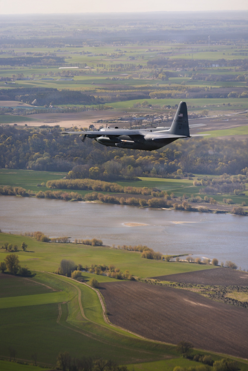 180th Airlift Squadron airmen fly alongside a MiG-29 fighter jet