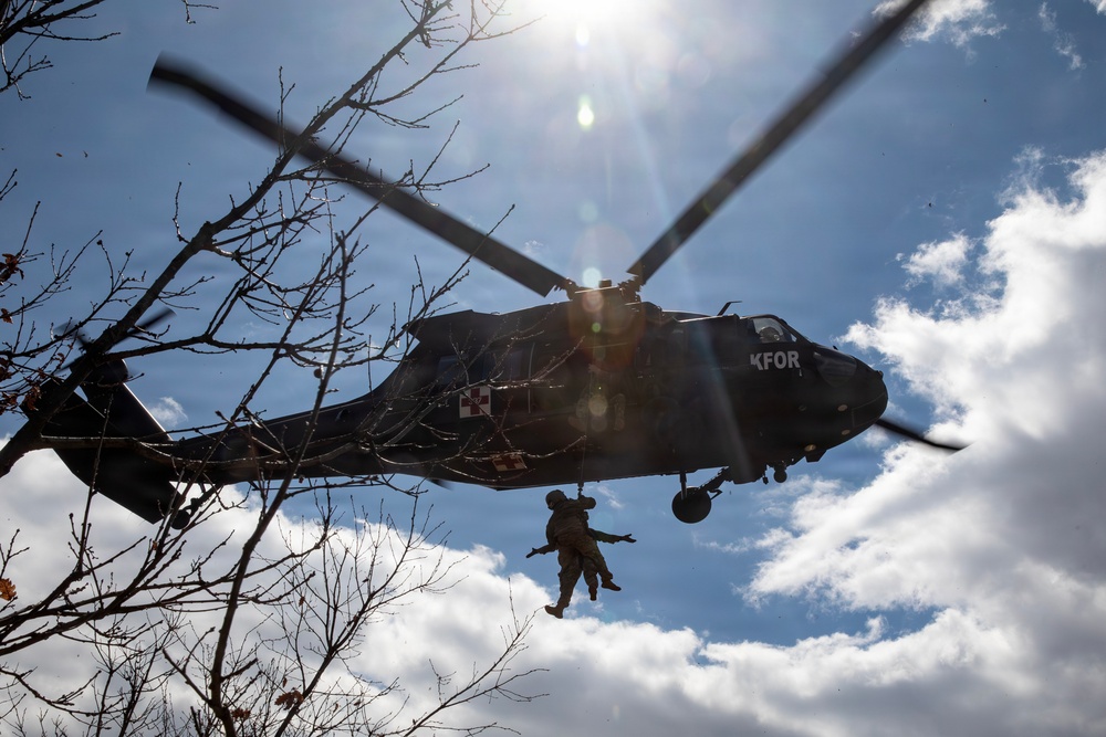 KFOR units synchronize efforts during medevac hoist training