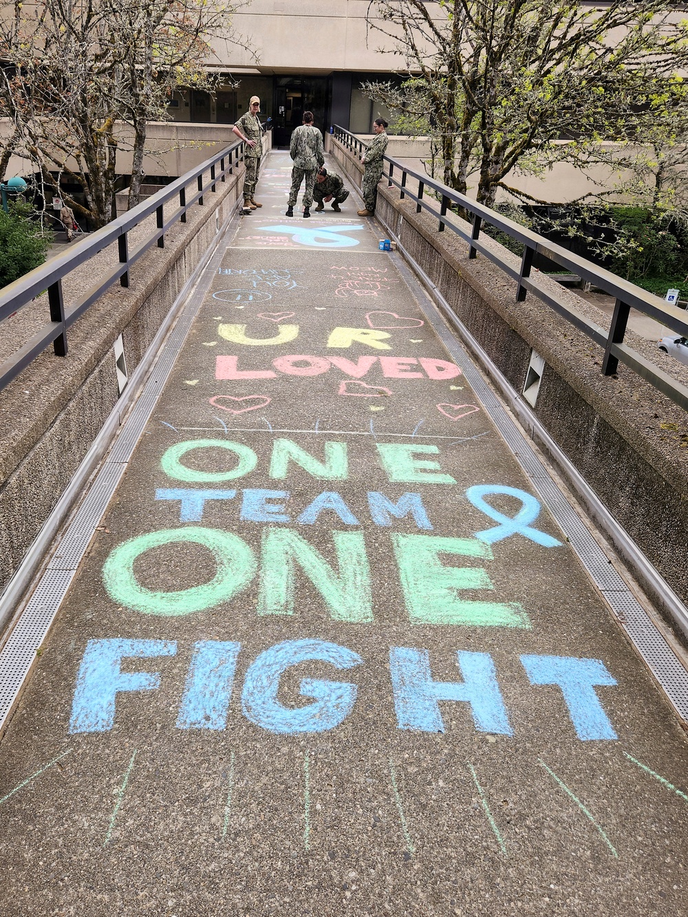 Drawing a line: NMRTC Bremerton highlights SAAPM with sidewalk art