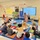 First-grade students at DoWEA Elliott Elementary participate in a phonics lesson on the classroom rug