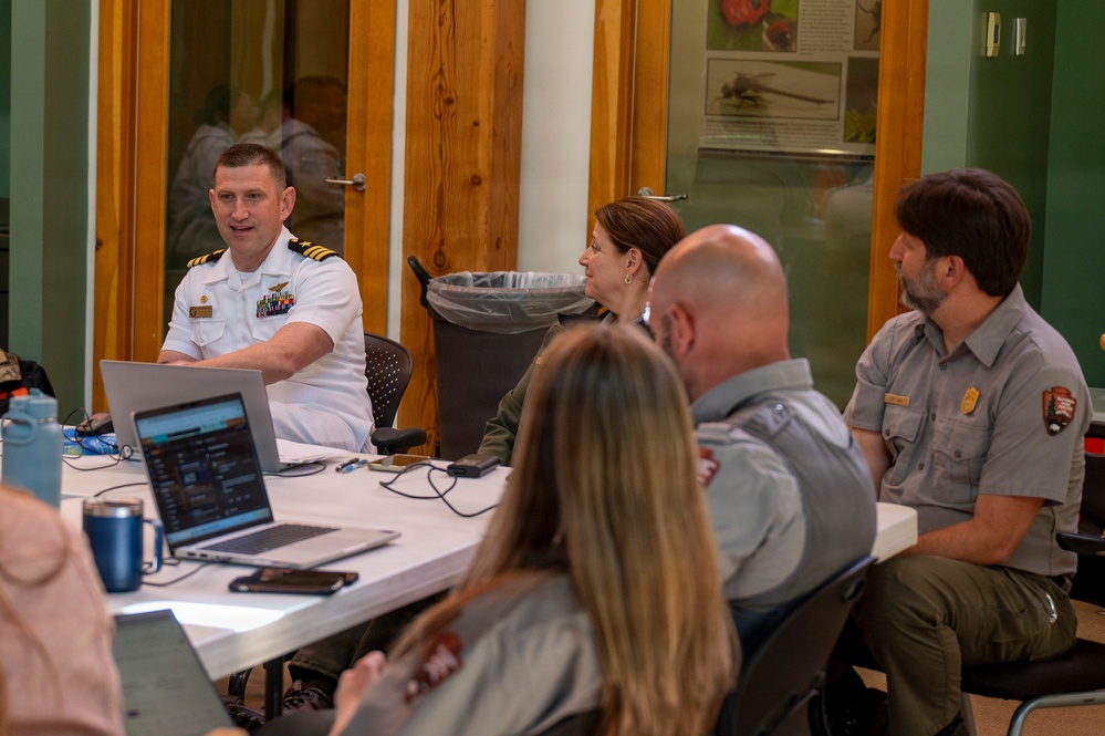 Cmdr. Yates Speaks With Park Rangers
