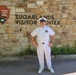 Navy Sailor Poses For Photo