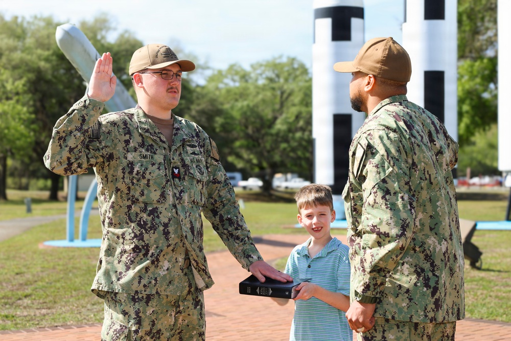 SWFLANT Sailor Reenlists at Missile Display