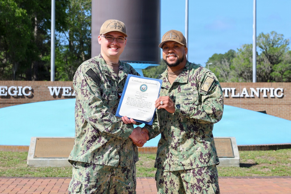SWFLANT Sailor Reenlists at Missile Display