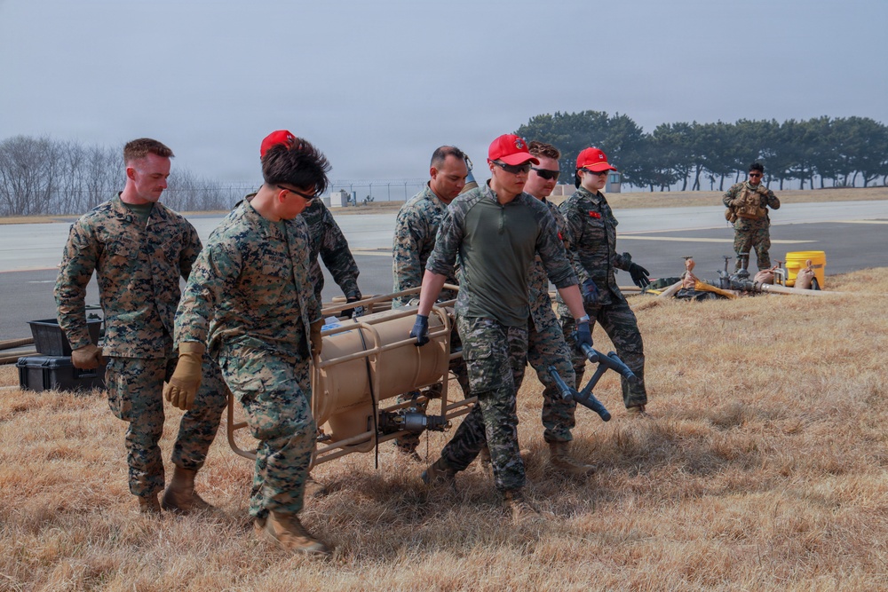 MWSS-174, Republic of Korea Marines discuss forward arming, refueling operations at Kunsan Air Base, South Korea