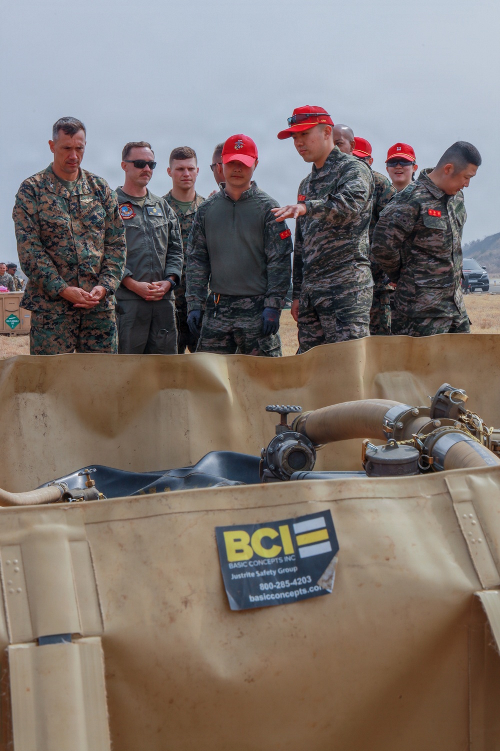 MWSS-174, Republic of Korea Marines discuss forward arming, refueling operations at Kunsan Air Base, South Korea