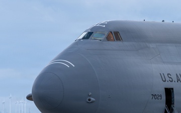 Travis AFB tows C-5 into position for Wings Over Solano