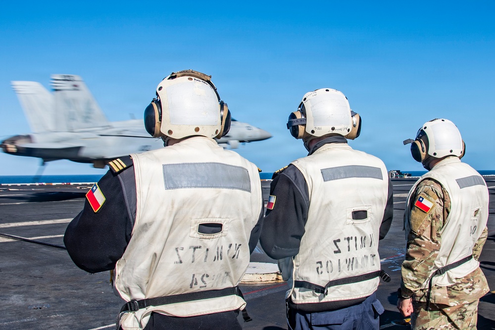 Embarked Chilean Naval Officers Observe Nimitz Flight Operations