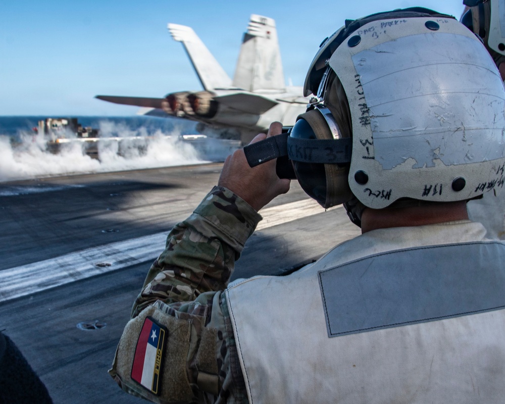 Embarked Chilean Naval Officers Observe Nimitz Flight Operations