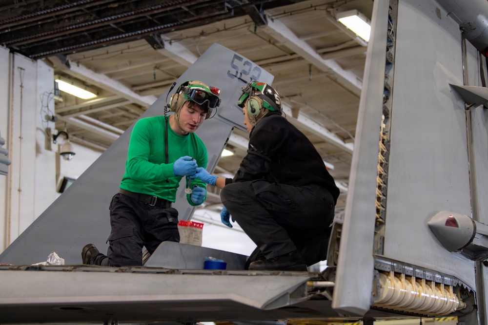 Sailors Conduct Maintenance