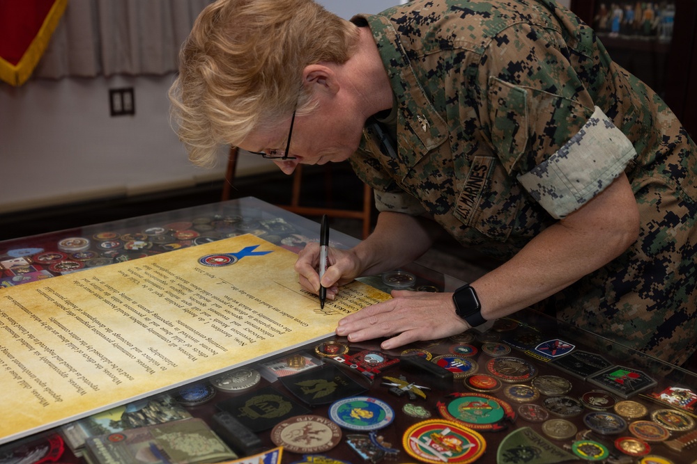 Col. Karin Fitzgerald signs the Child Abuse Prevention Month Proclamation