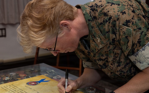 Col. Karin Fitzgerald signs the Child Abuse Prevention Month Proclamation