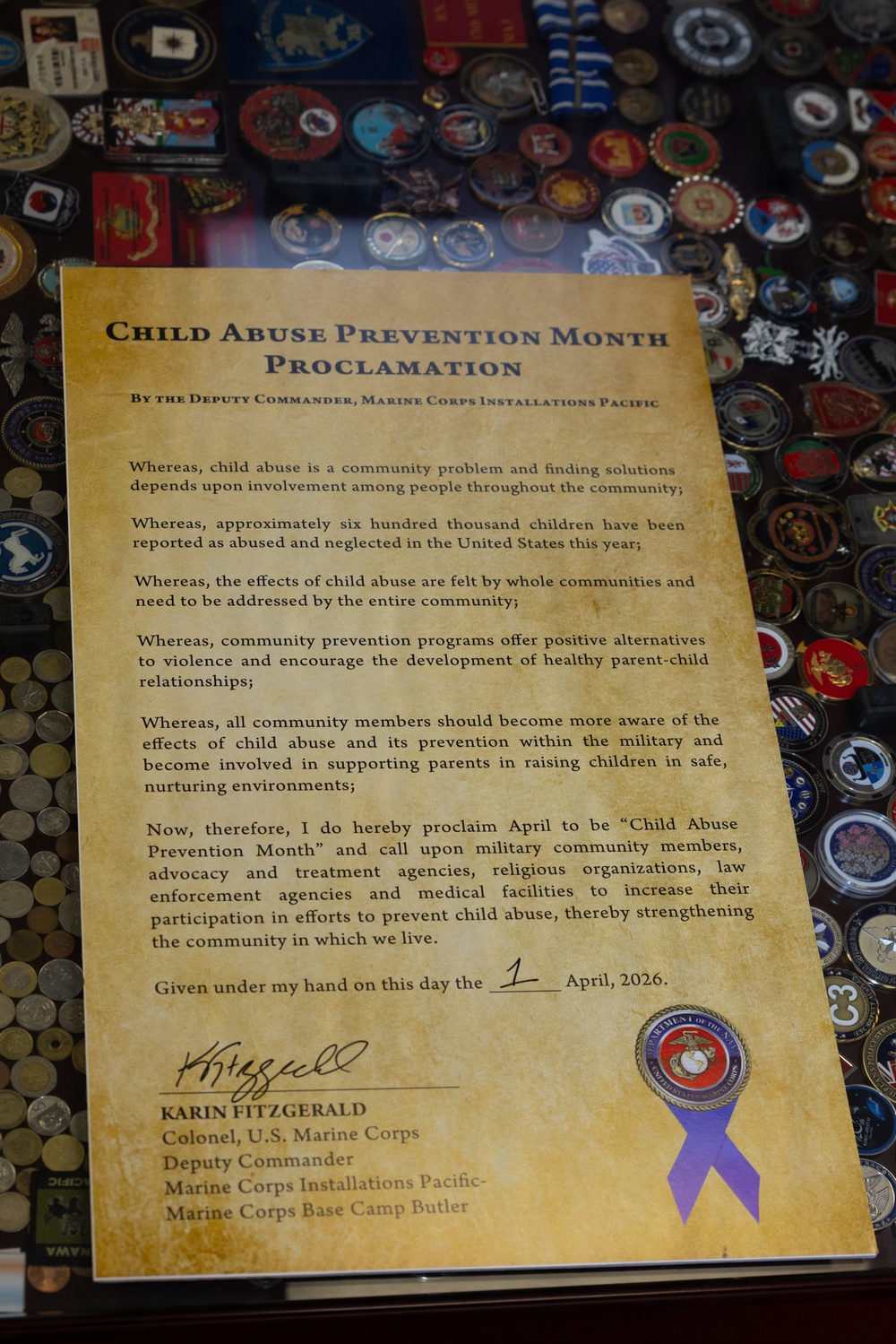 Col. Karin Fitzgerald signs the Child Abuse Prevention Month Proclamation