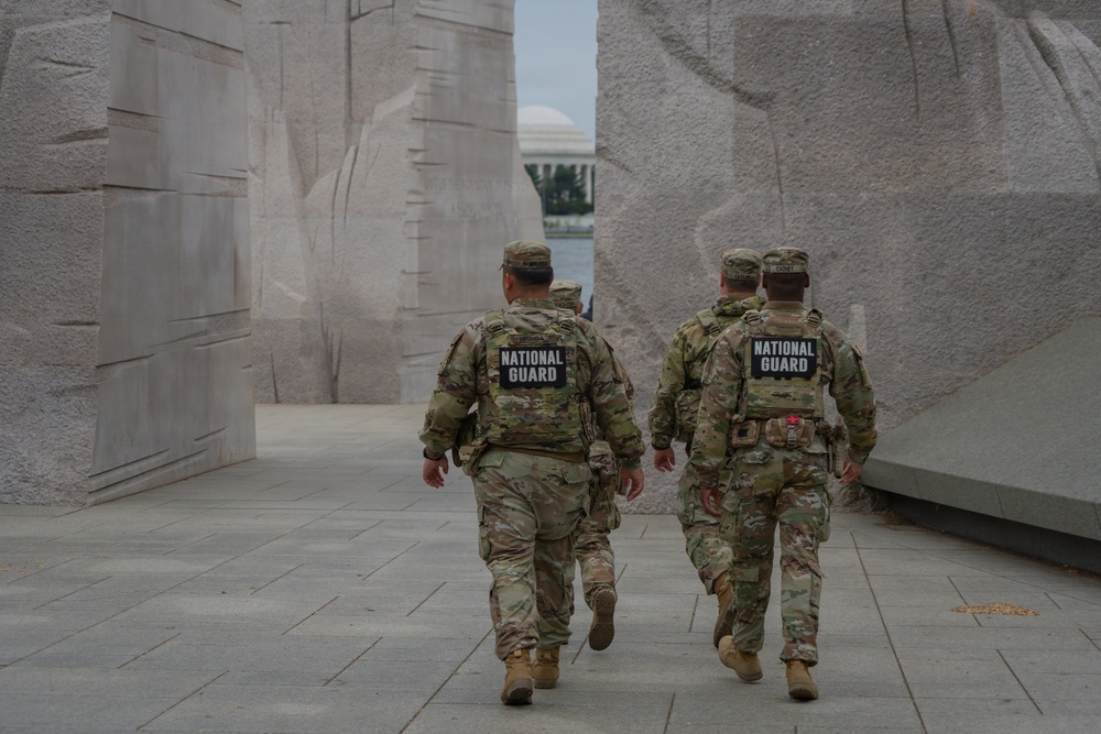 Mississippi National Guardsmen patrol during the Autism Speaks Empower Walk &amp; 5K Run in Washington, D.C.