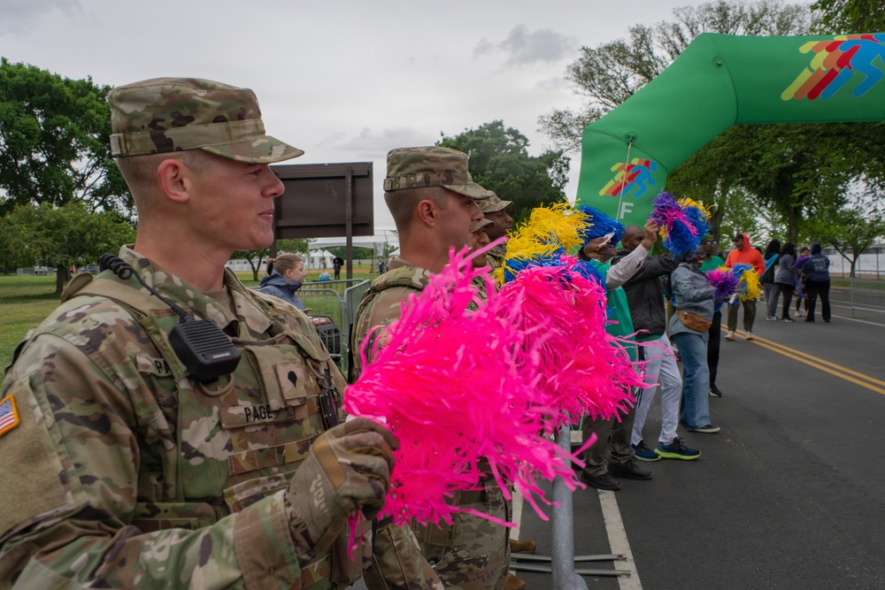 Mississippi National Guardsmen patrol during the Autism Speaks Empower Walk &amp; 5K Run in Washington, D.C.