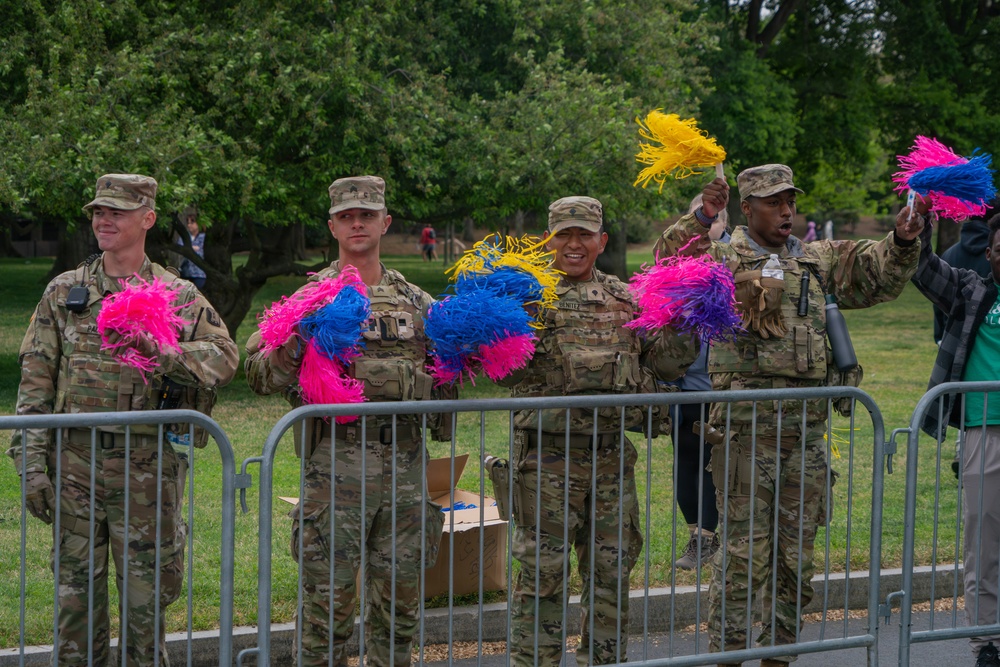 Mississippi National Guardsmen patrol during the Autism Speaks Empower Walk &amp; 5K Run in Washington, D.C.